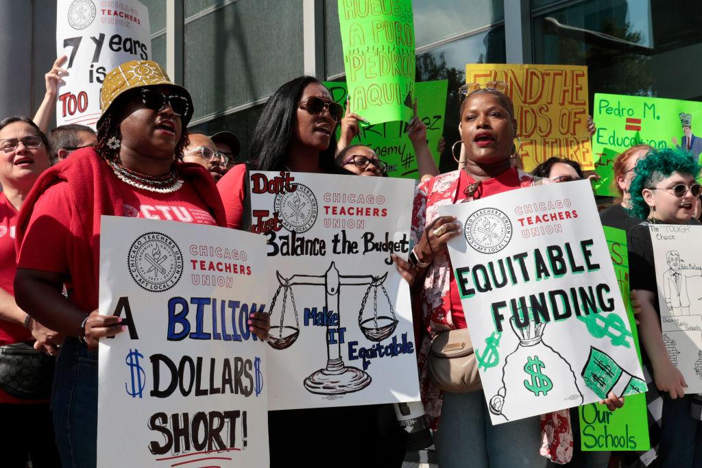 Chicago Teachers Union members, students, and supporters outside of Jones College Prep before a Board of Education meeting over the summer.