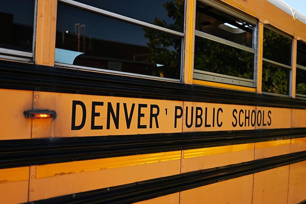 Close up view of a Denver Public Schools yellow bus