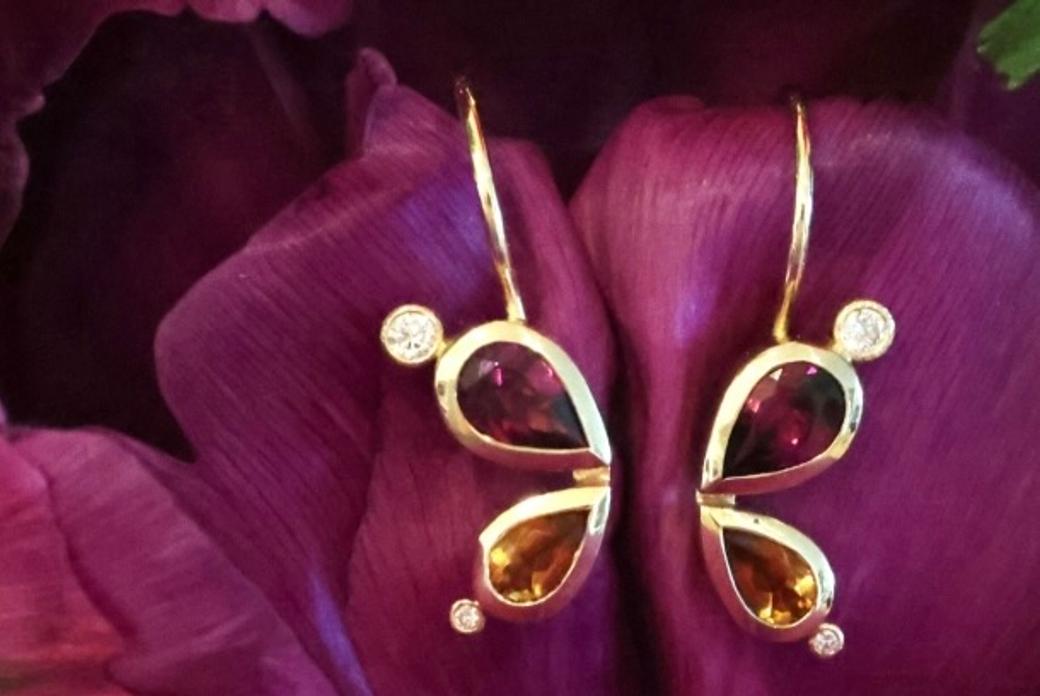 Display ad for Beaumont Jewelry: butterfly earrings