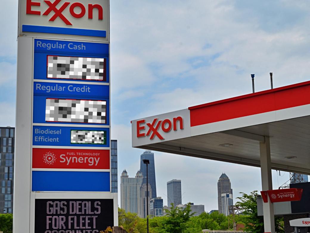 An Exxon station with the prices digitally censored out