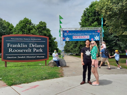 A photo of myself and my fiancé at the 2021 Philadelphia Flower Show at FDR Park. (Brittany Valentine/City Cast Philly)