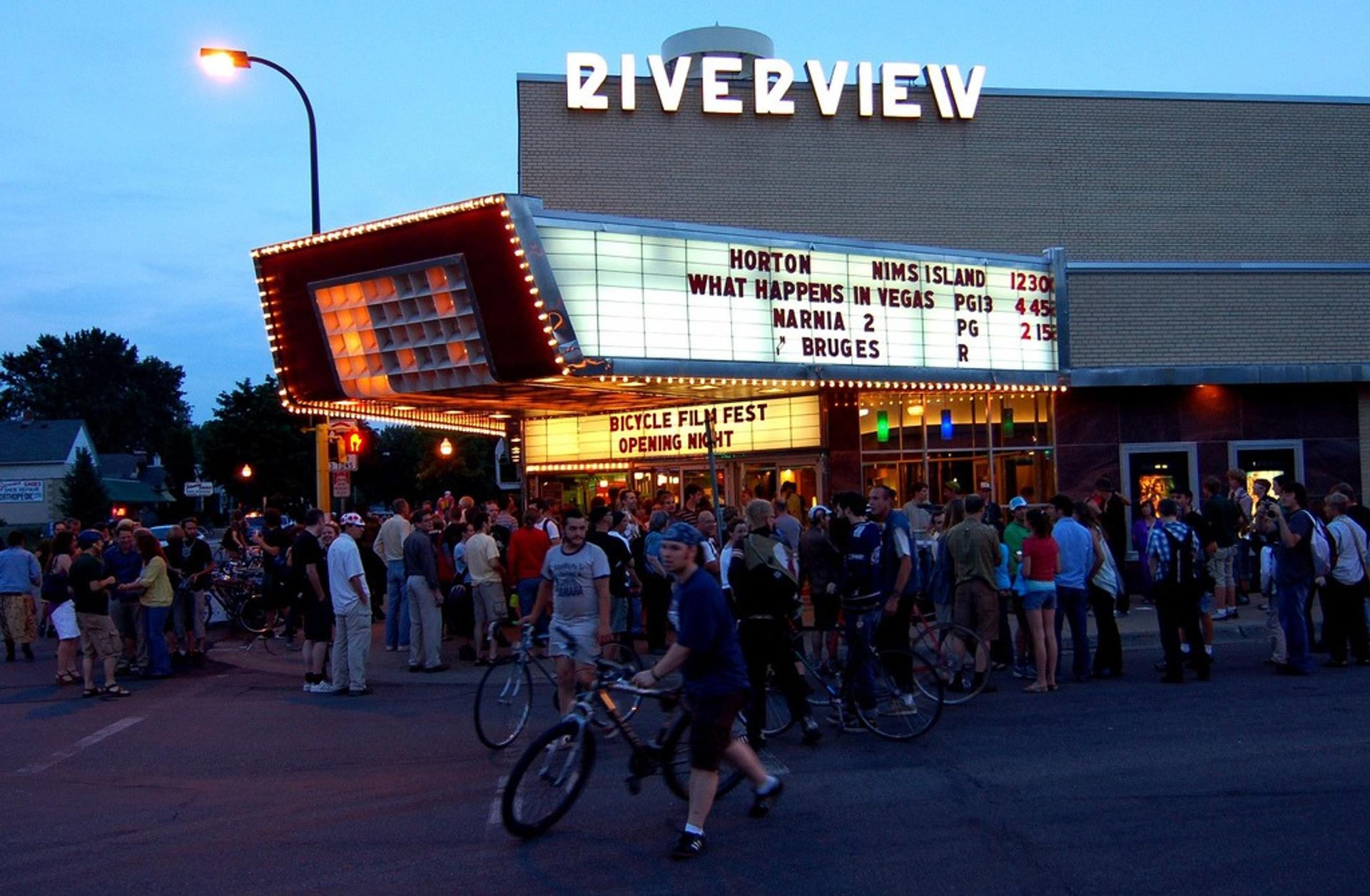 A crowd gathered outside of the Riverview Theater