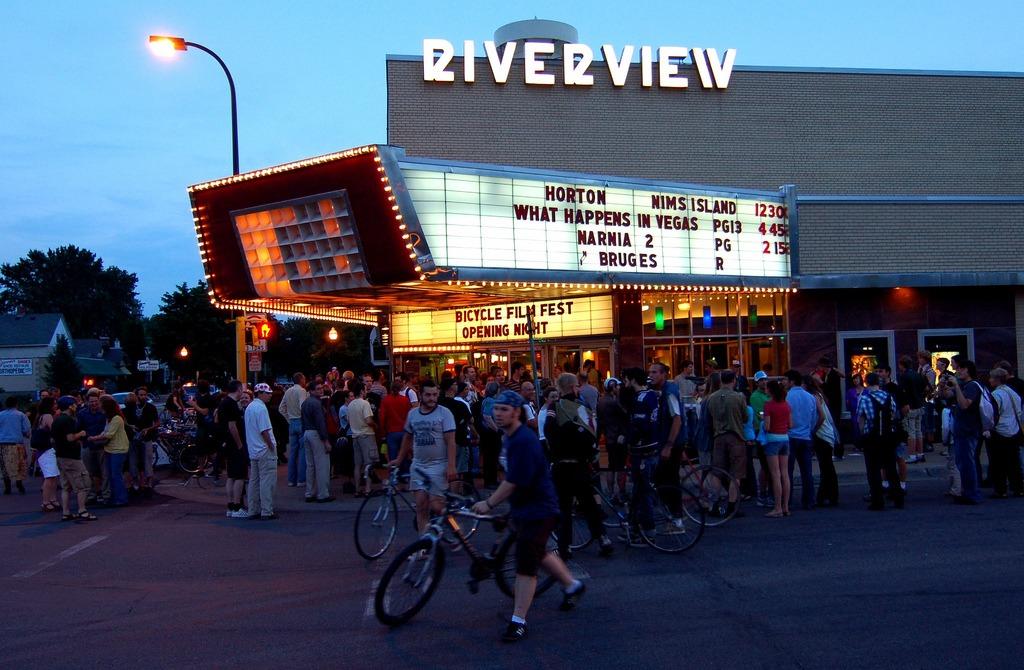 A crowd gathered outside of the Riverview Theater
