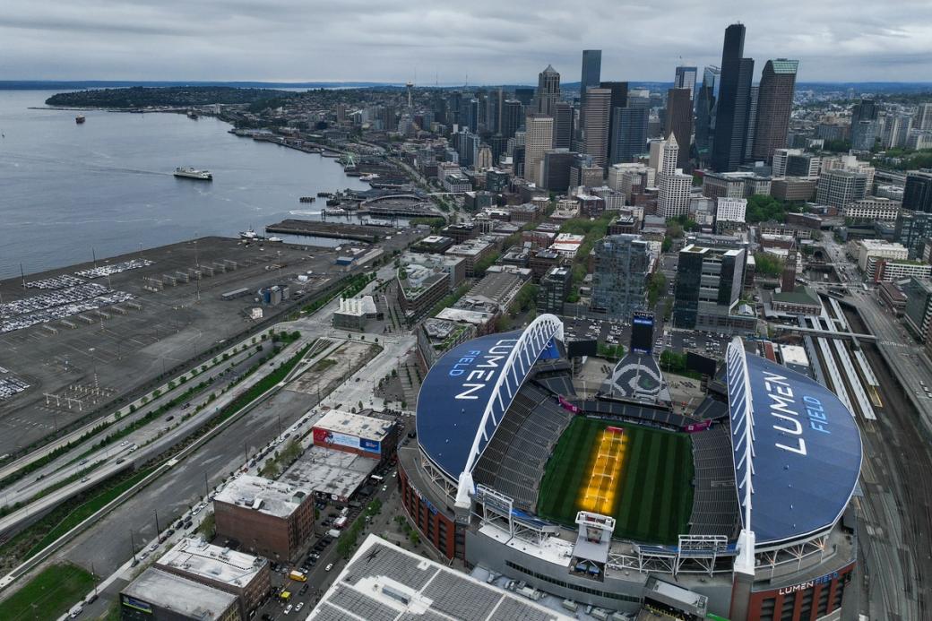 Grass grows beneath lamps during an aerial view of Lumen Field on May 6, 2026.