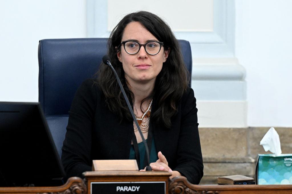 Former Councilmember Sarah Parady sits in the City Council Chambers with a name plaque that says “Parady”.