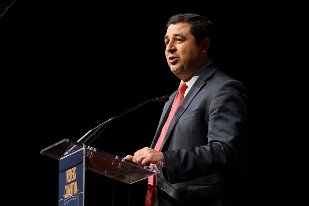 Wisconsin Attorney General Josh Kaul stands at a podium.