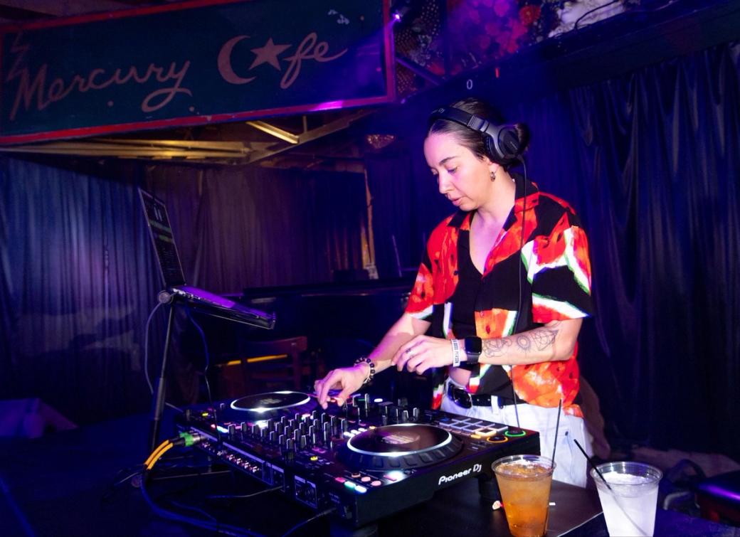 A DJ performs at The Pearl