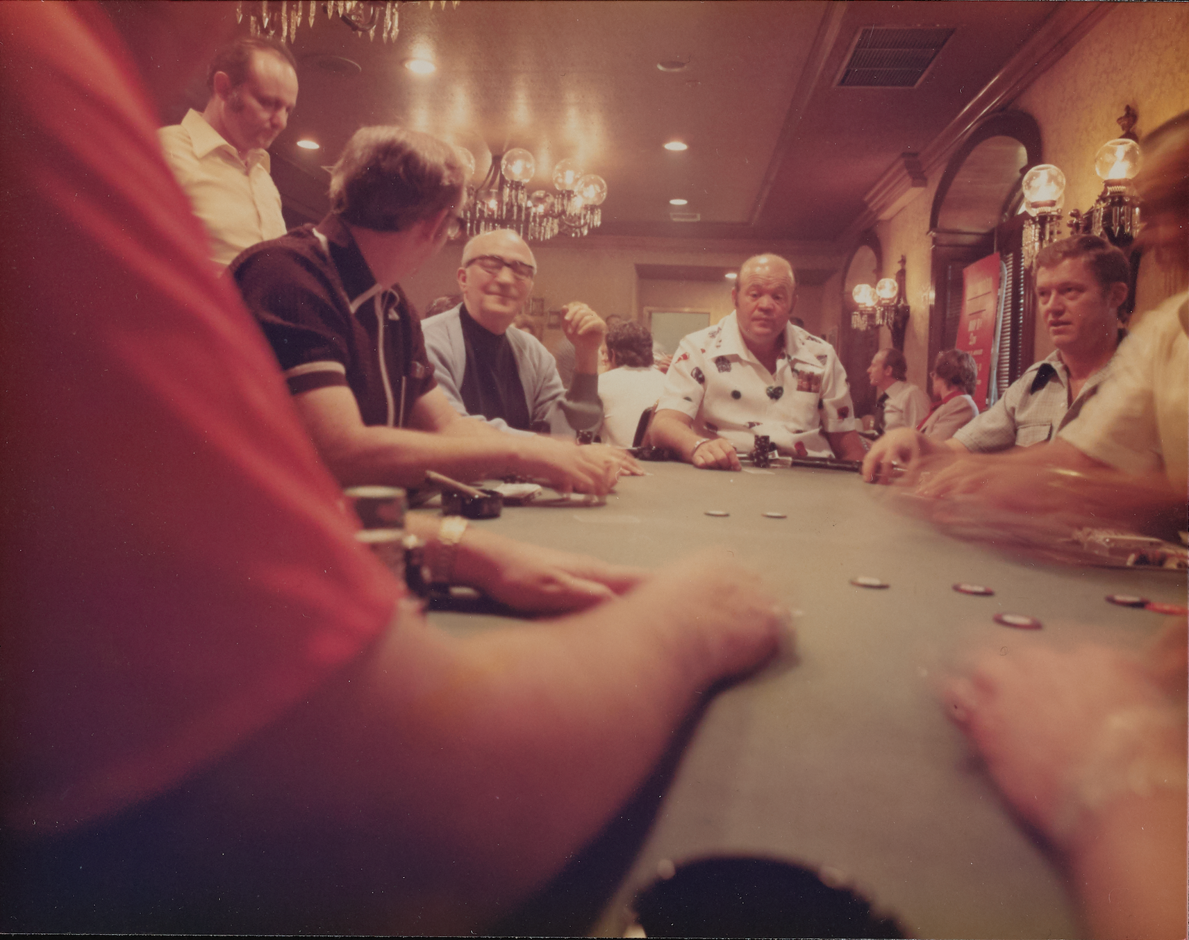 Photo of a poker game circa 1970s.