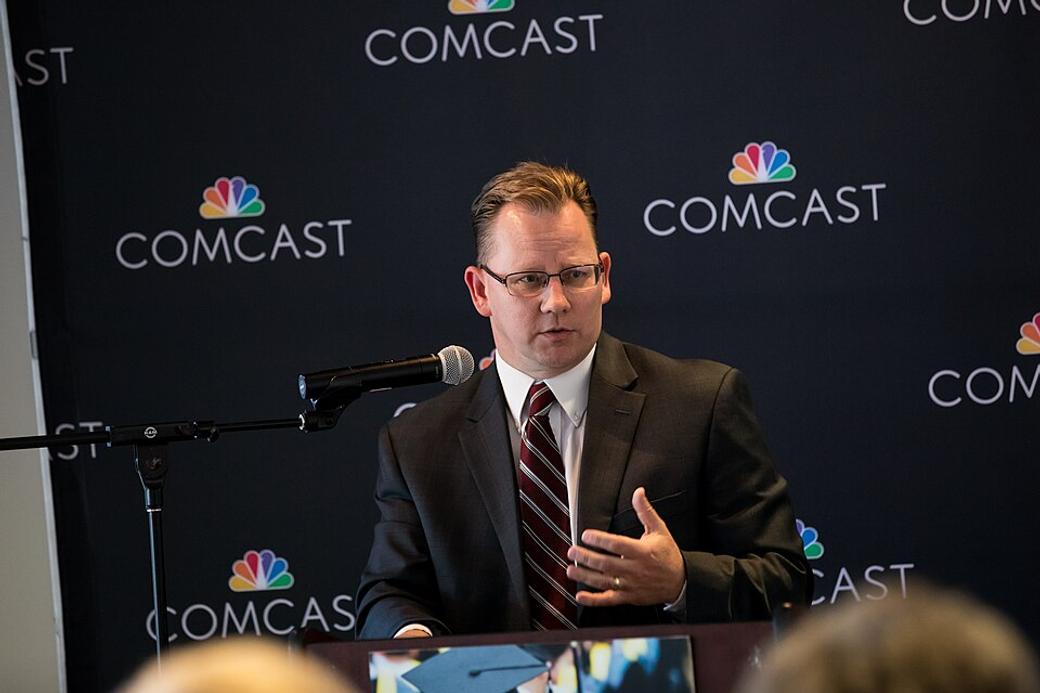 An image of Chris Reykdal speaking to the media