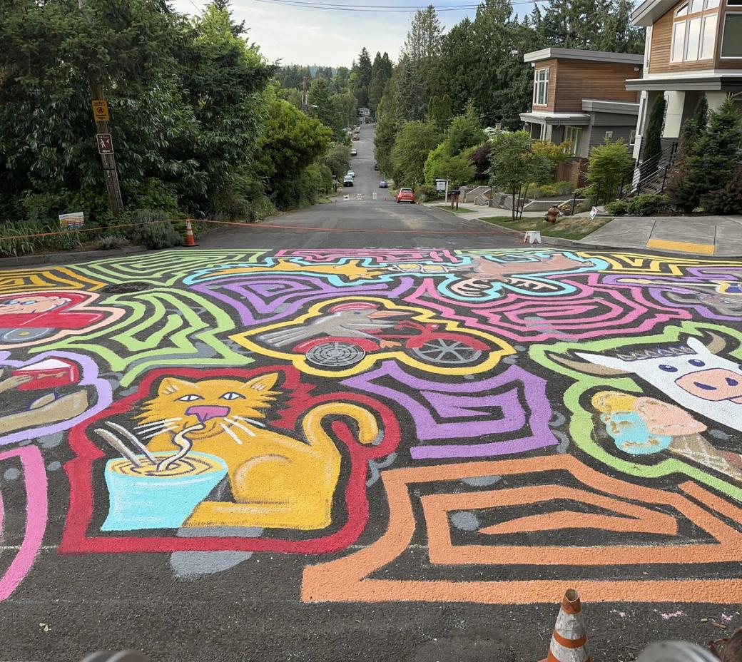An animal-filled street mural.