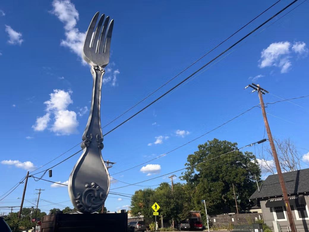 A large sculpture of a fork.