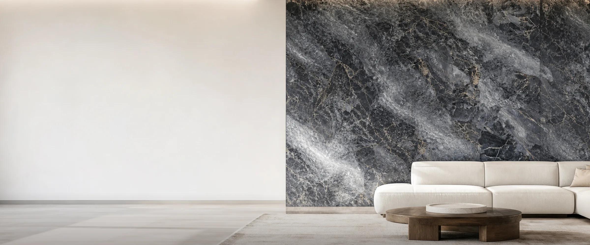 Dark marble-effect SPC wall panels behind a cream sofa