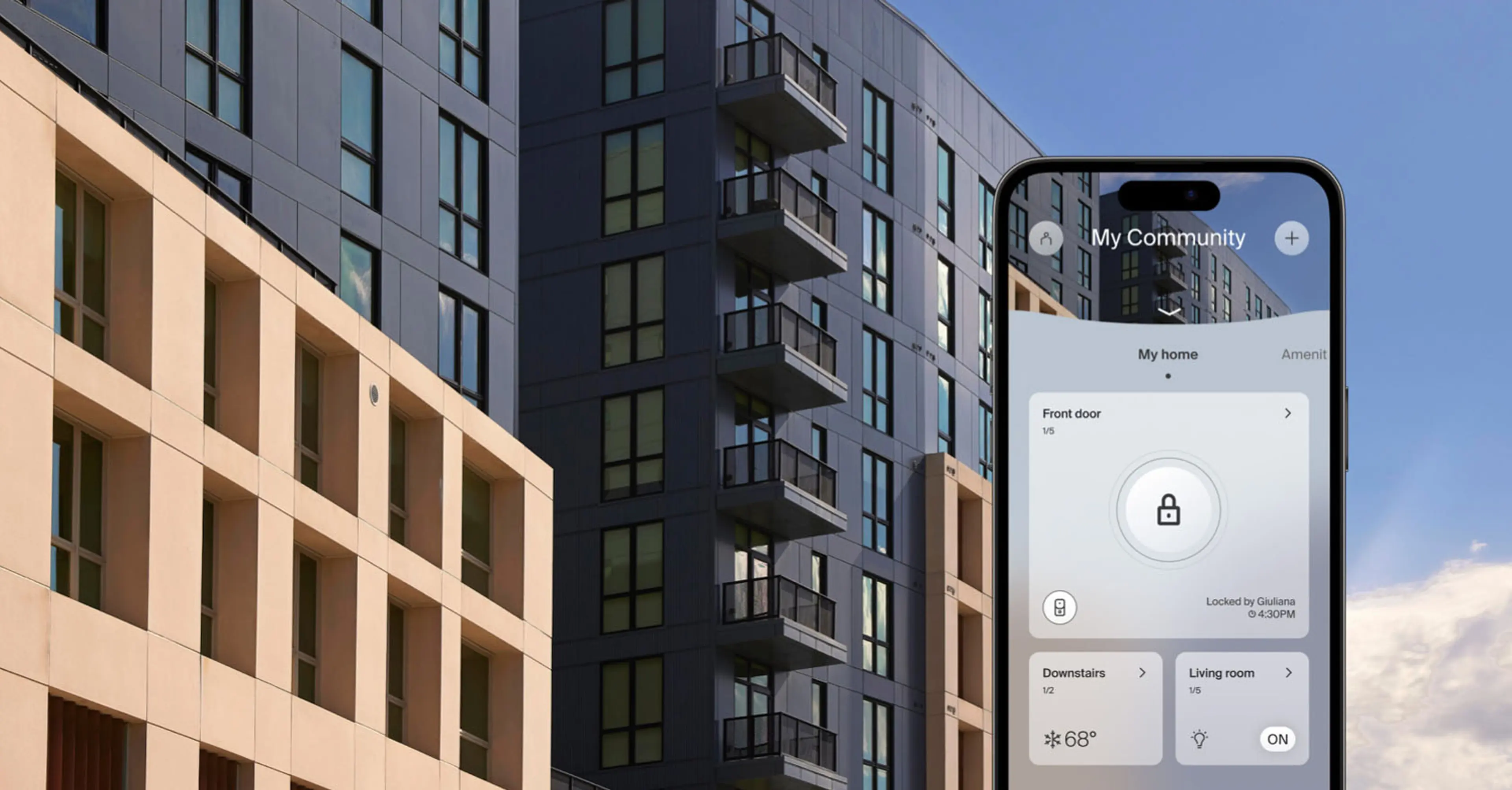 Multifamily building with mobile phone and Ambient app in front