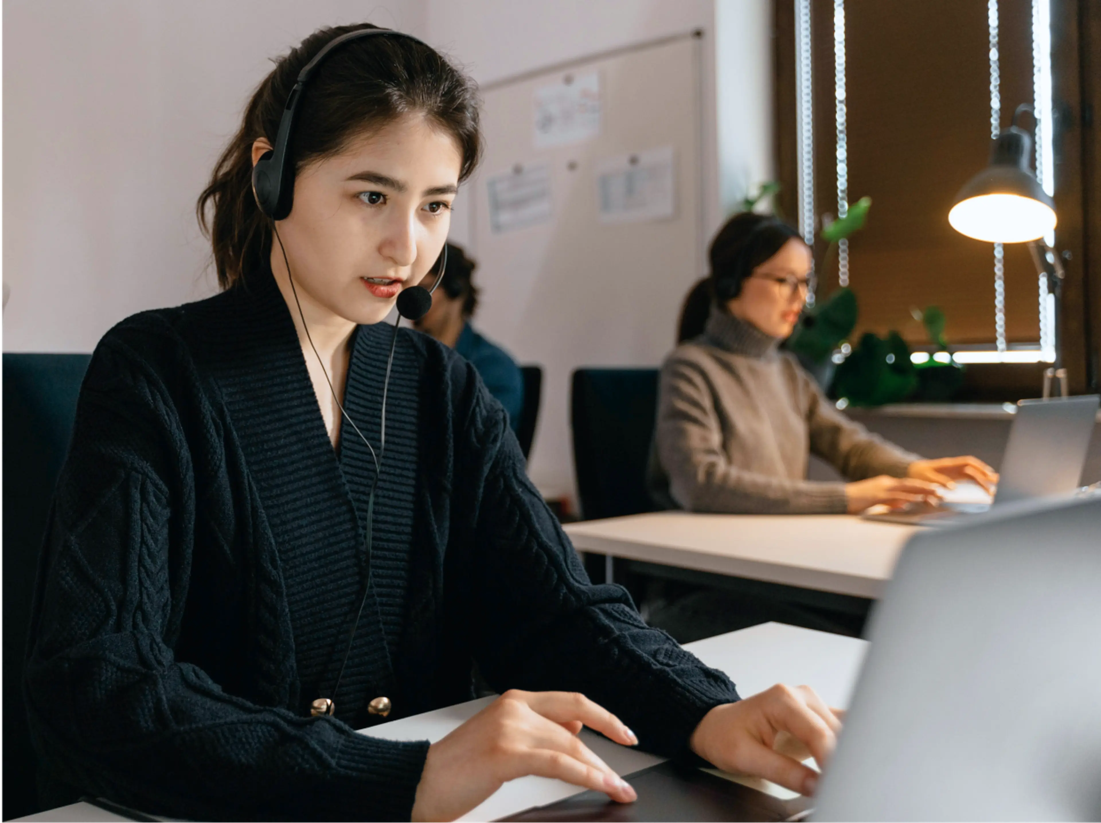 Multifamily professional on a phone, providing support