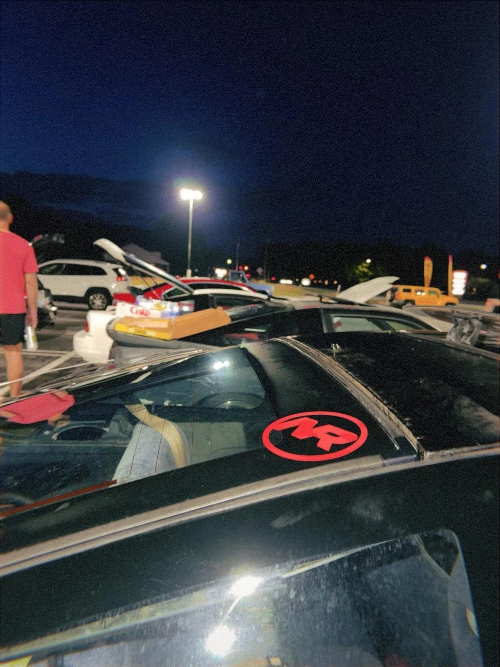 No Rush decal on an S13 at a gathering