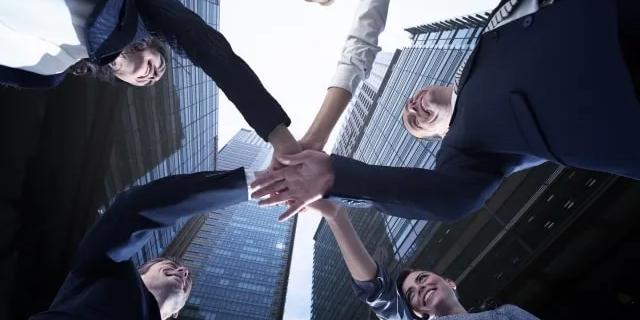 People putting hands together