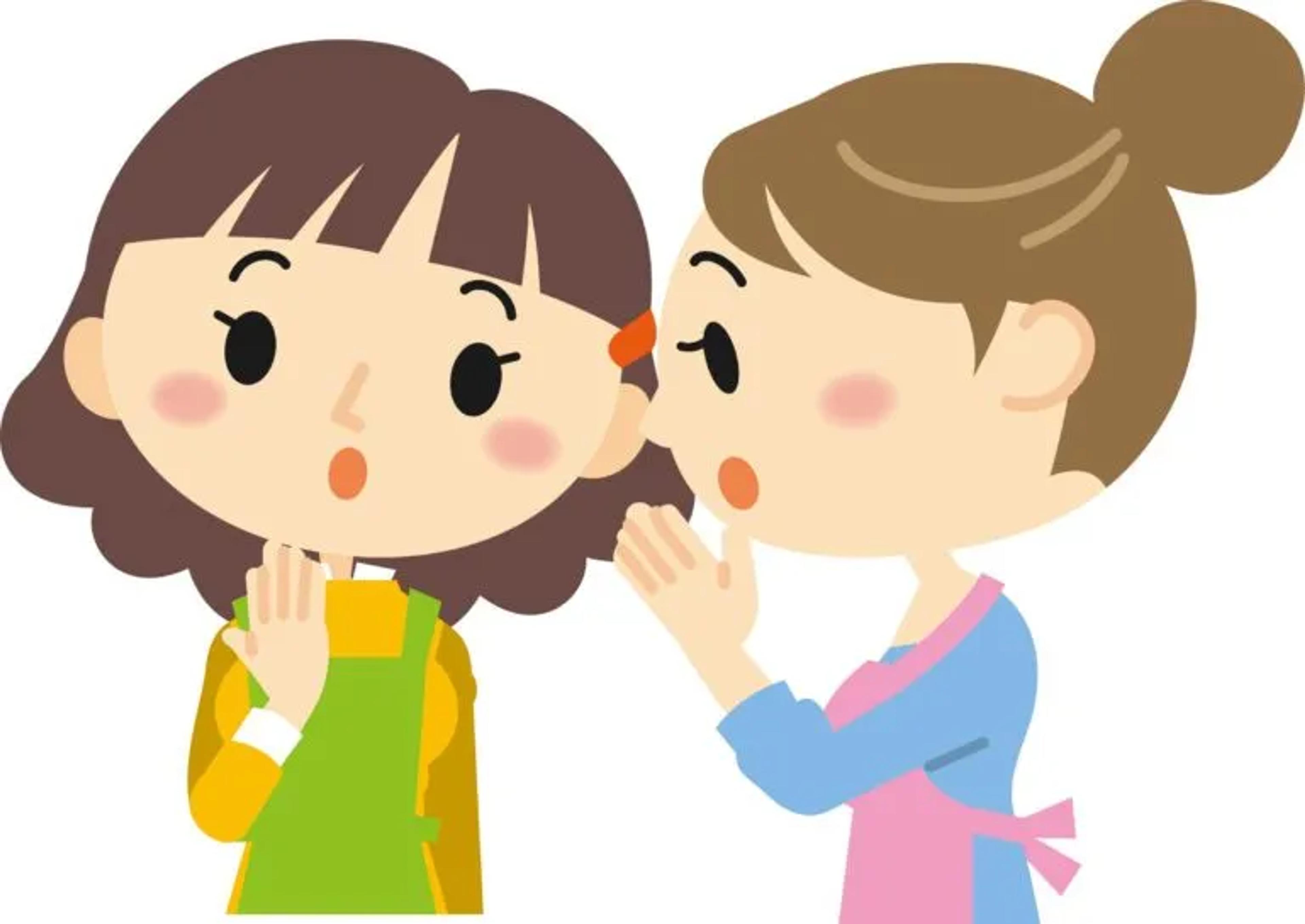 two women telling secrets