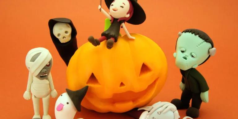 Halloween Monsters around a Pumpkin