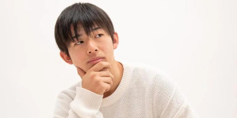 guy holding chin wondering about how to use kun