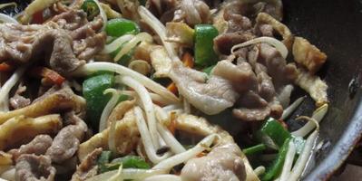 stir-frying meat and vegetables