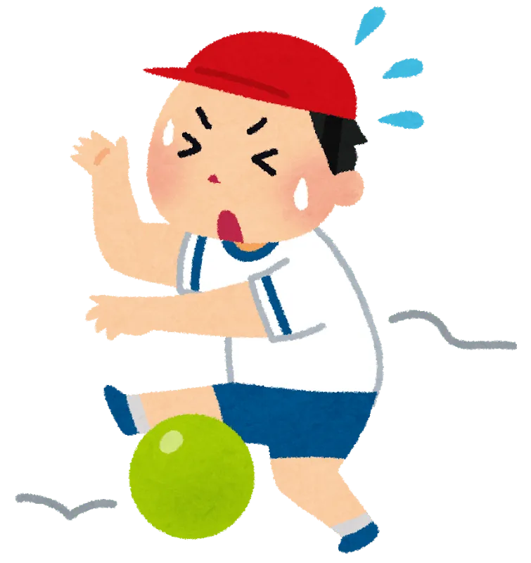 Boy trying to kick a ball but having trouble