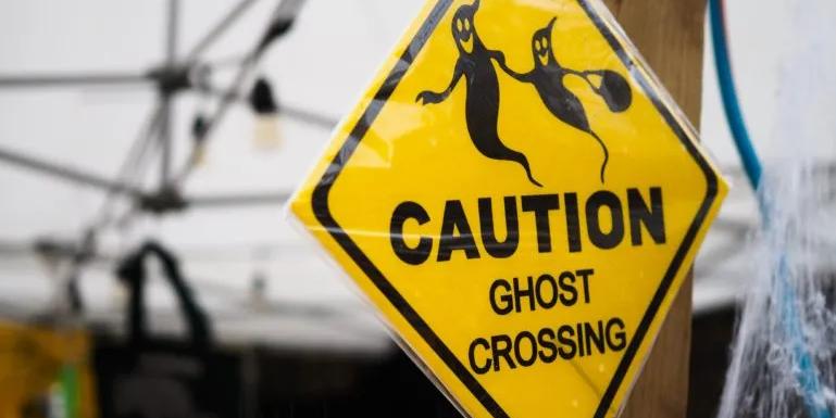 image of a ghost crossing sign