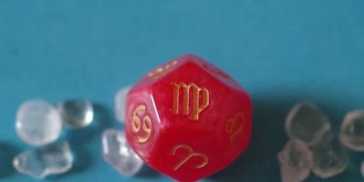 dice showing the Astrological sign Virgo