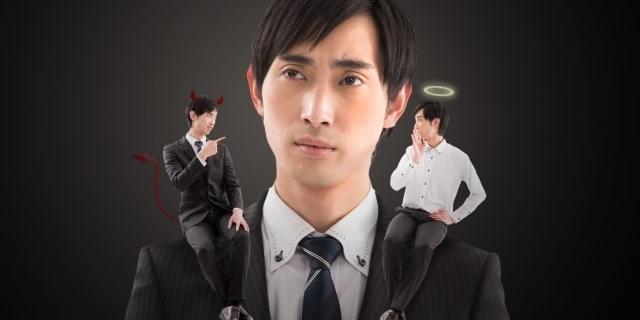 Man and a devil and an angel on his shoulder