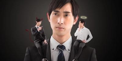 Man and a devil and an angel on his shoulder