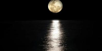 image of moon over water