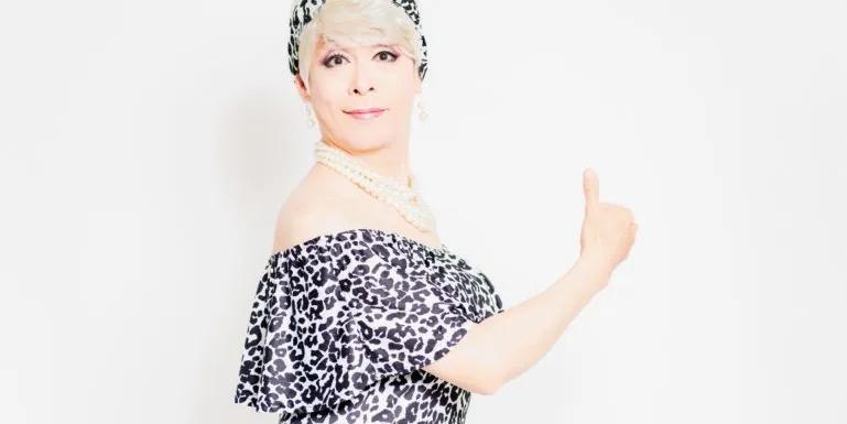 image of person holding up thumb to say yes