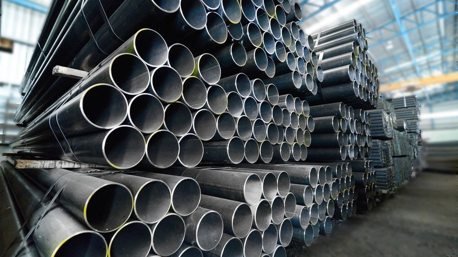 Stacked steel pipe in a warehouse