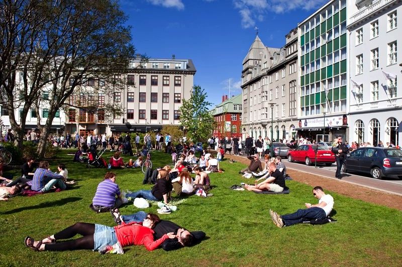 Locals enjoying Austurvöllur during summer