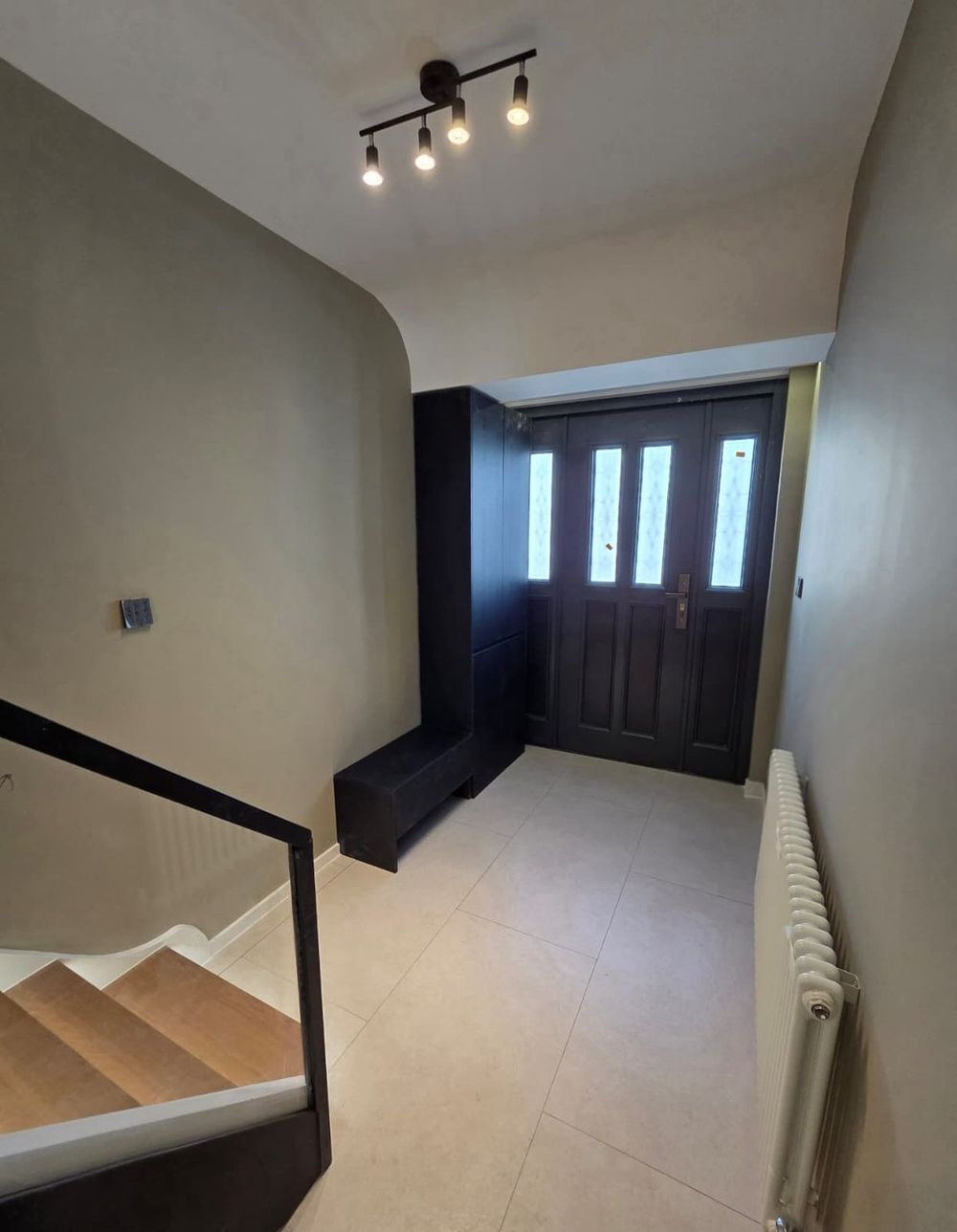 Entrance hall with bespoke shoe storage — Full House Renovation by TrustBuilt Projects