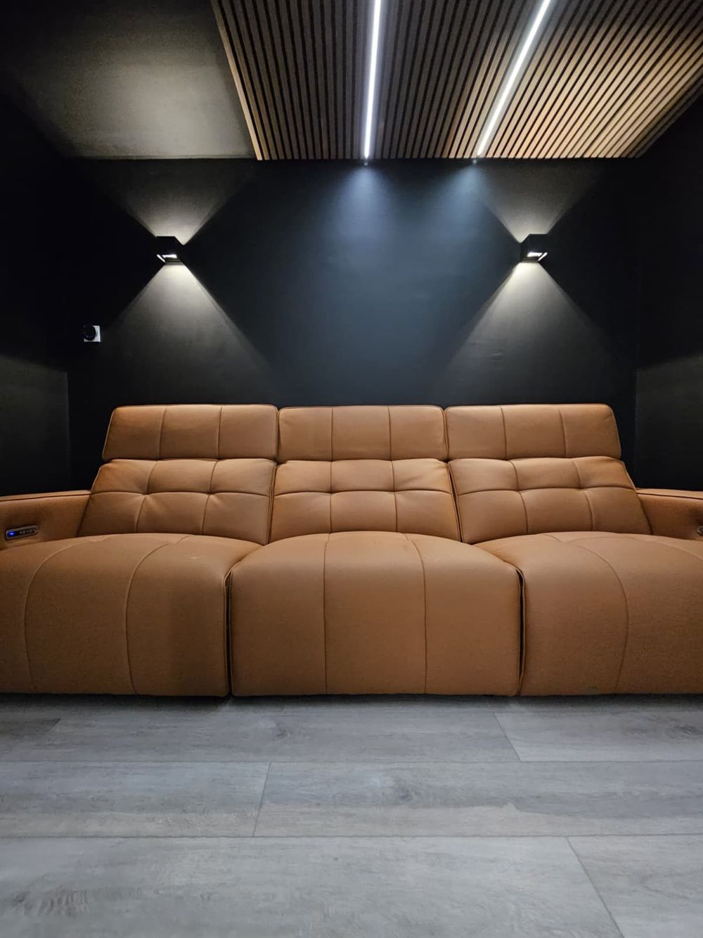 Cinema lounge with ambient lighting — Entertainment Room by TrustBuilt Projects
