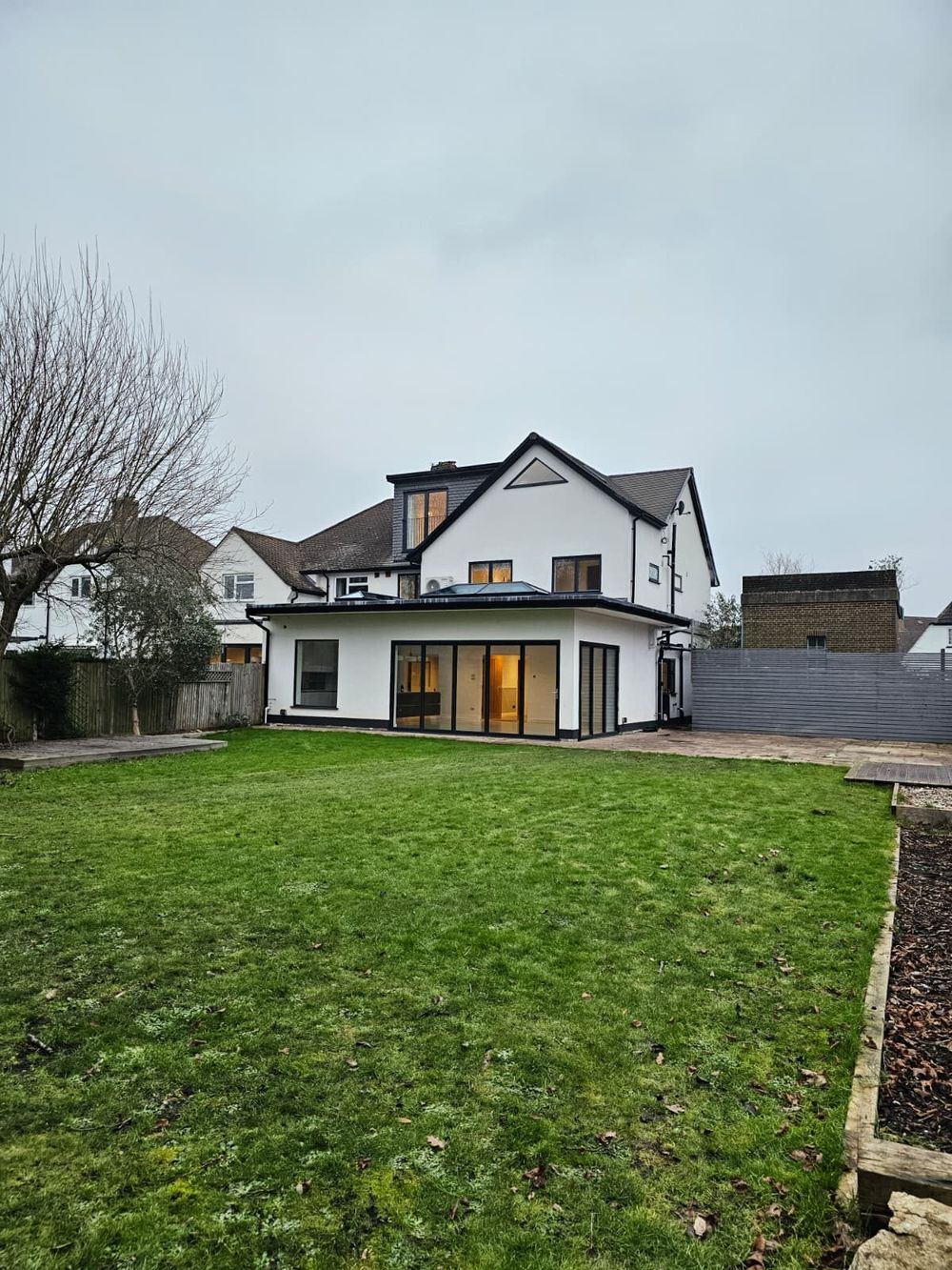 Exterior rear view of the completed extension — Rear Extension by TrustBuilt Projects