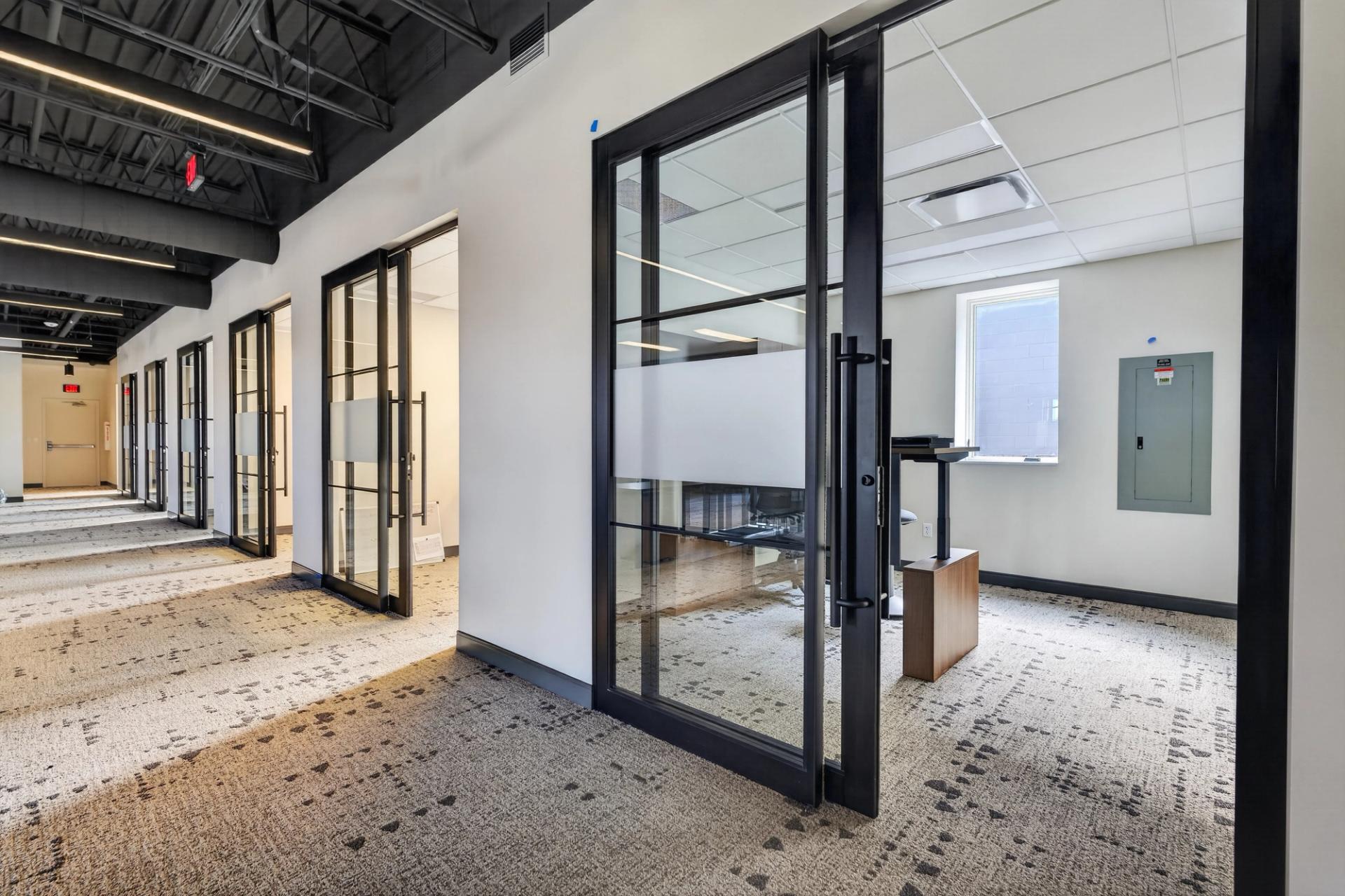 ThinWall aluminum door installation at Access Commercial office expansion by Montage Builders