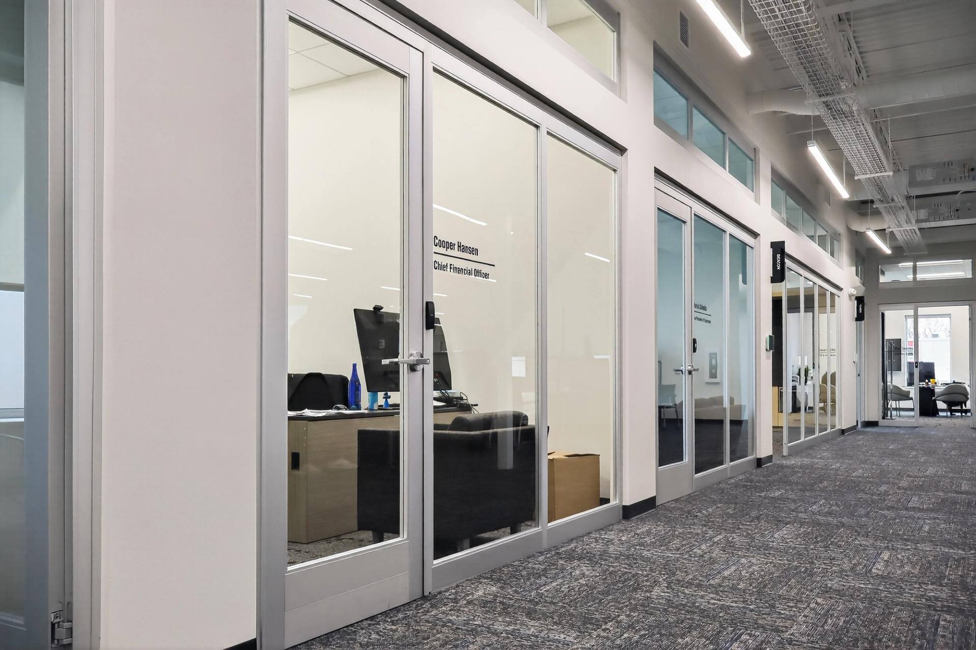 Aluminum door installation at Direct Companies by Beck & Hoffer Construction