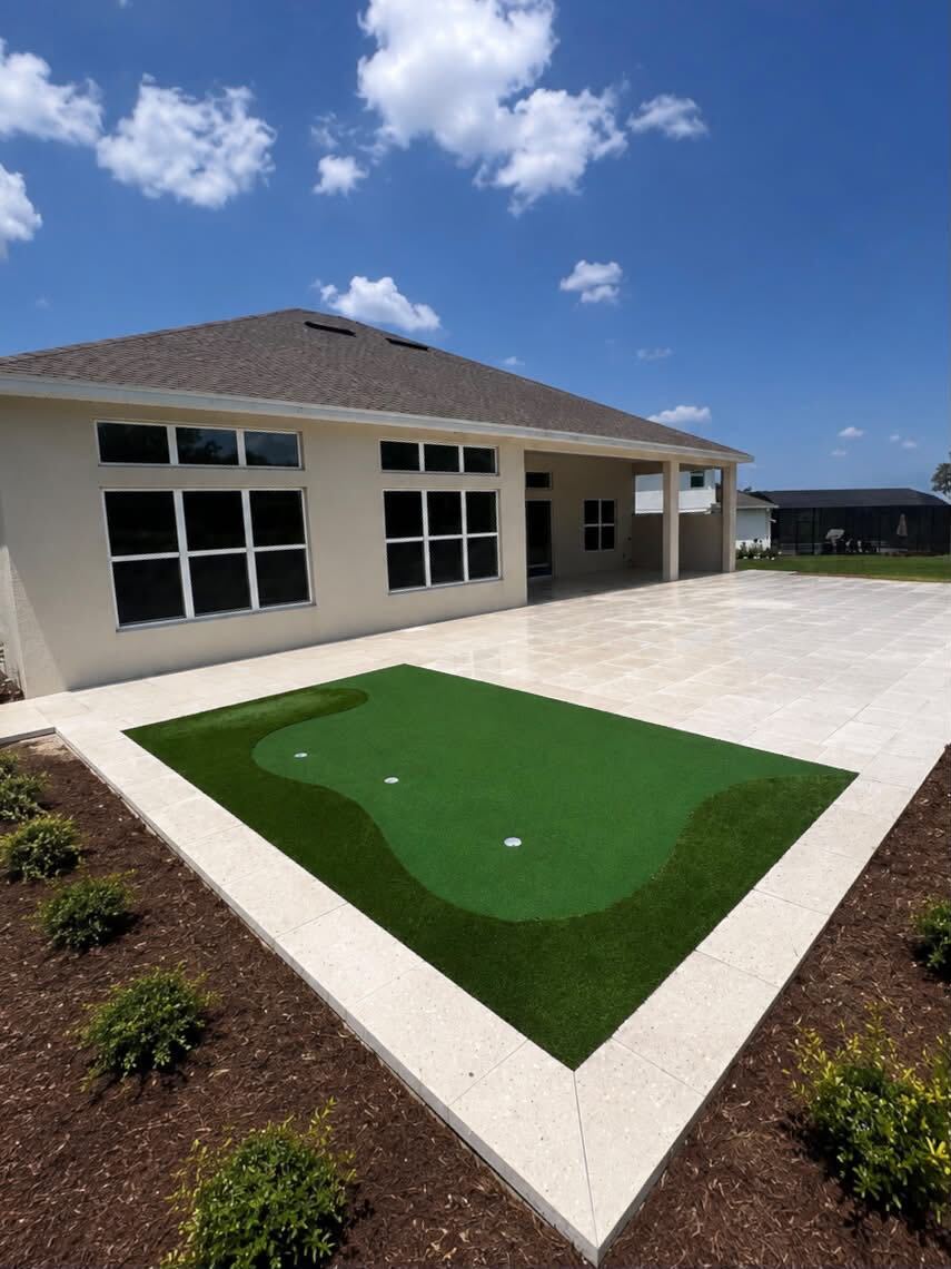 Paver patio with backyard putting green in Orlando FL
