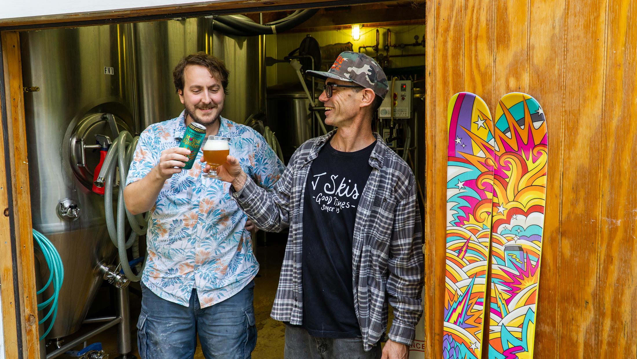 J and Lawson's brewer Brian cheersing the first pint of Mogul Masher Pale Ale