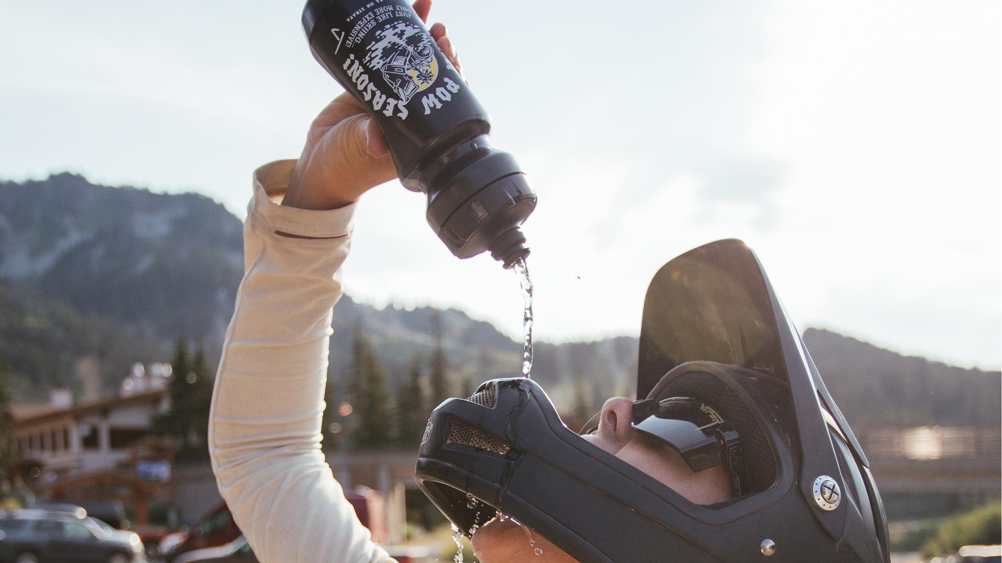 Alyssa Parsons drinking from a J skis bike bottle