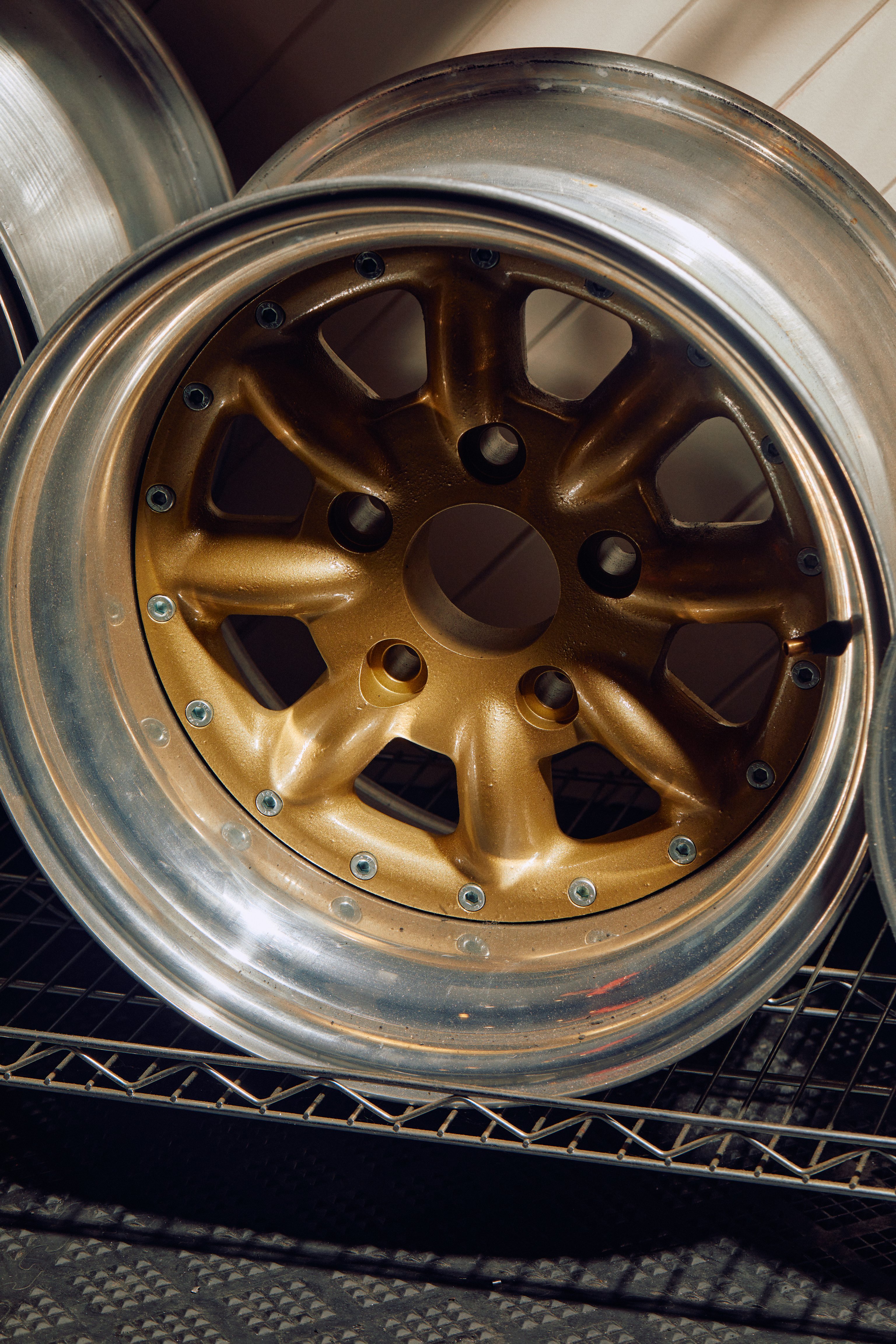 A metal wheel base with a gold interior