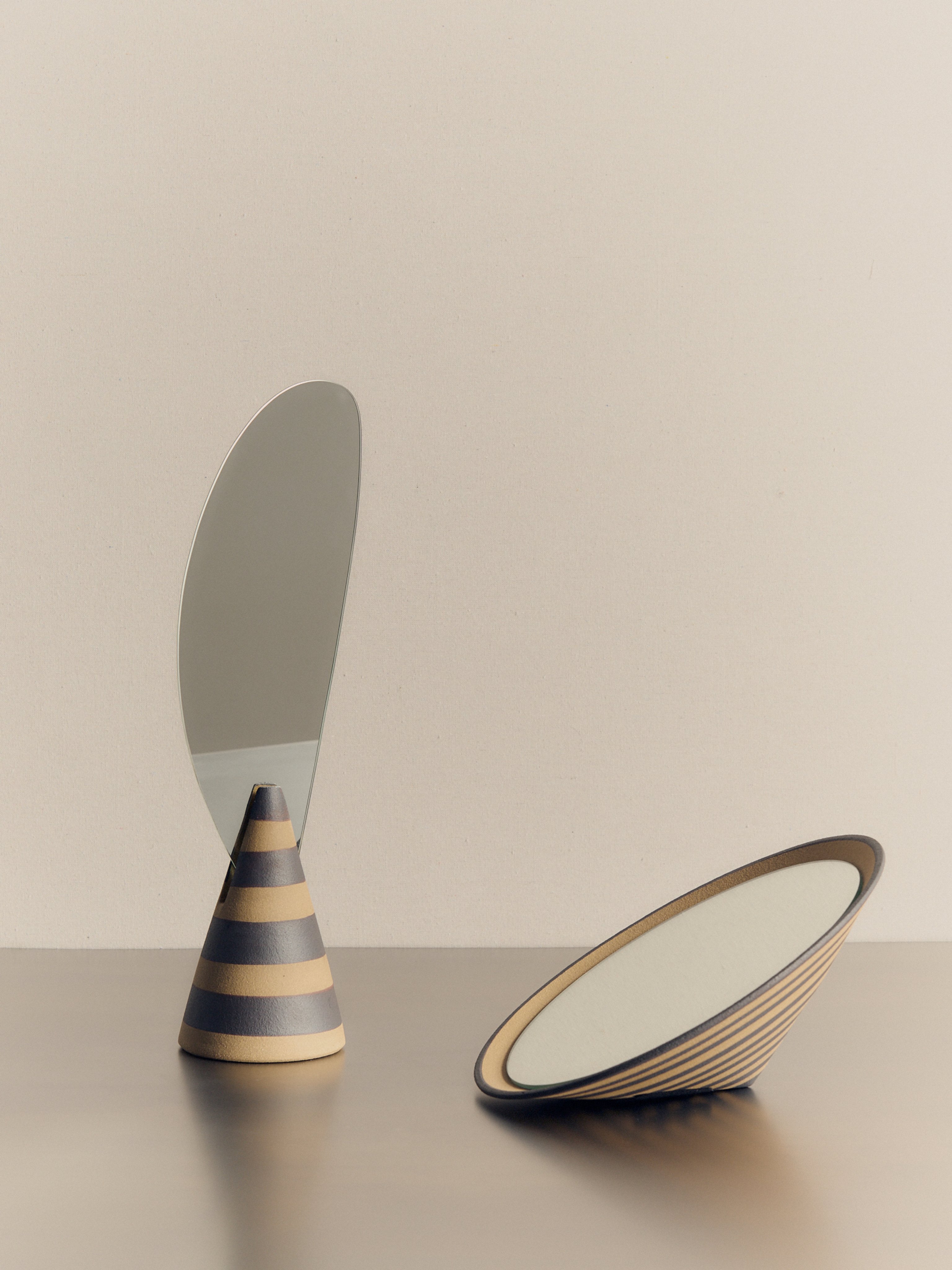 Striped ceramic mirrors