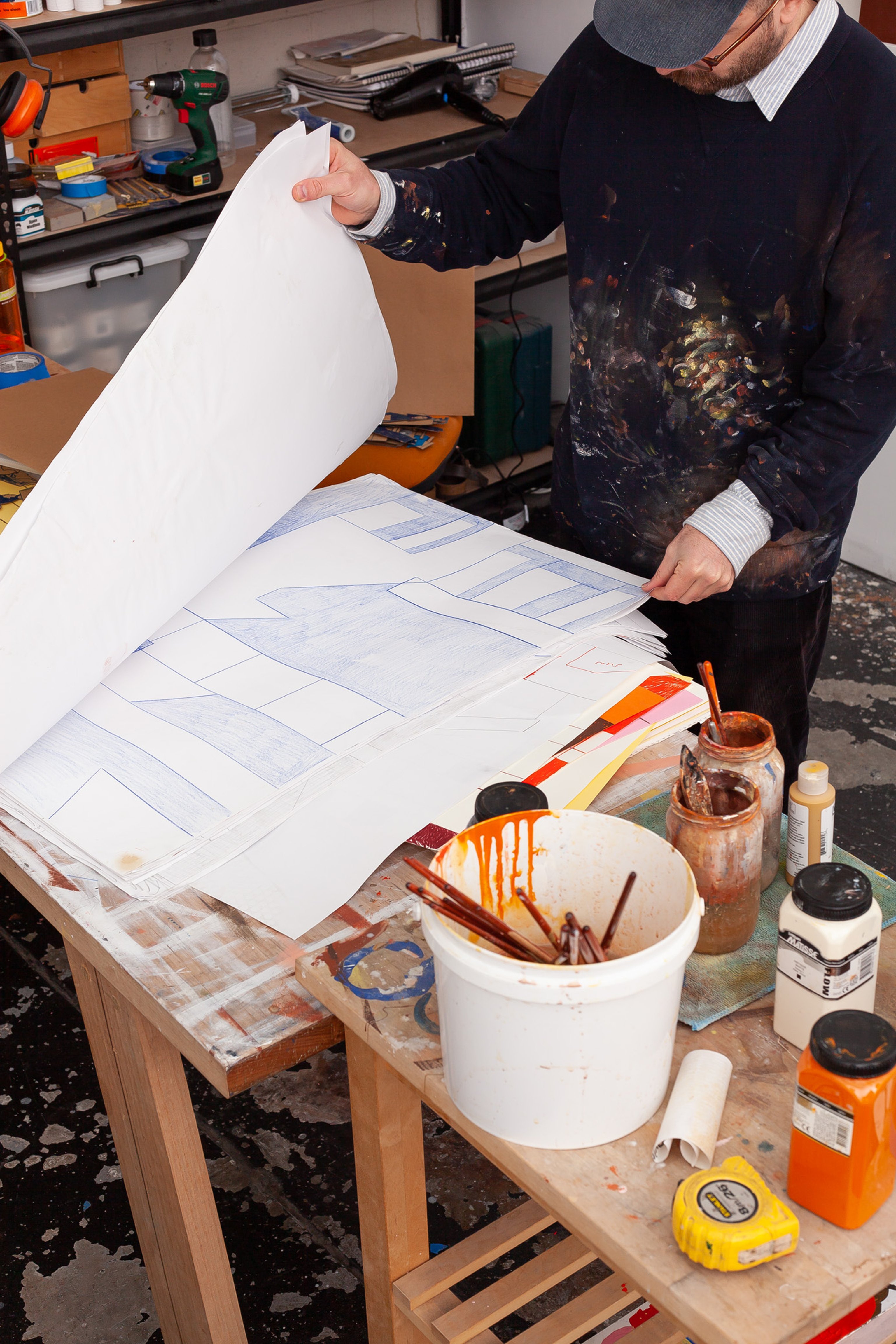 Mark Alsweiler working on an artwork in his studio