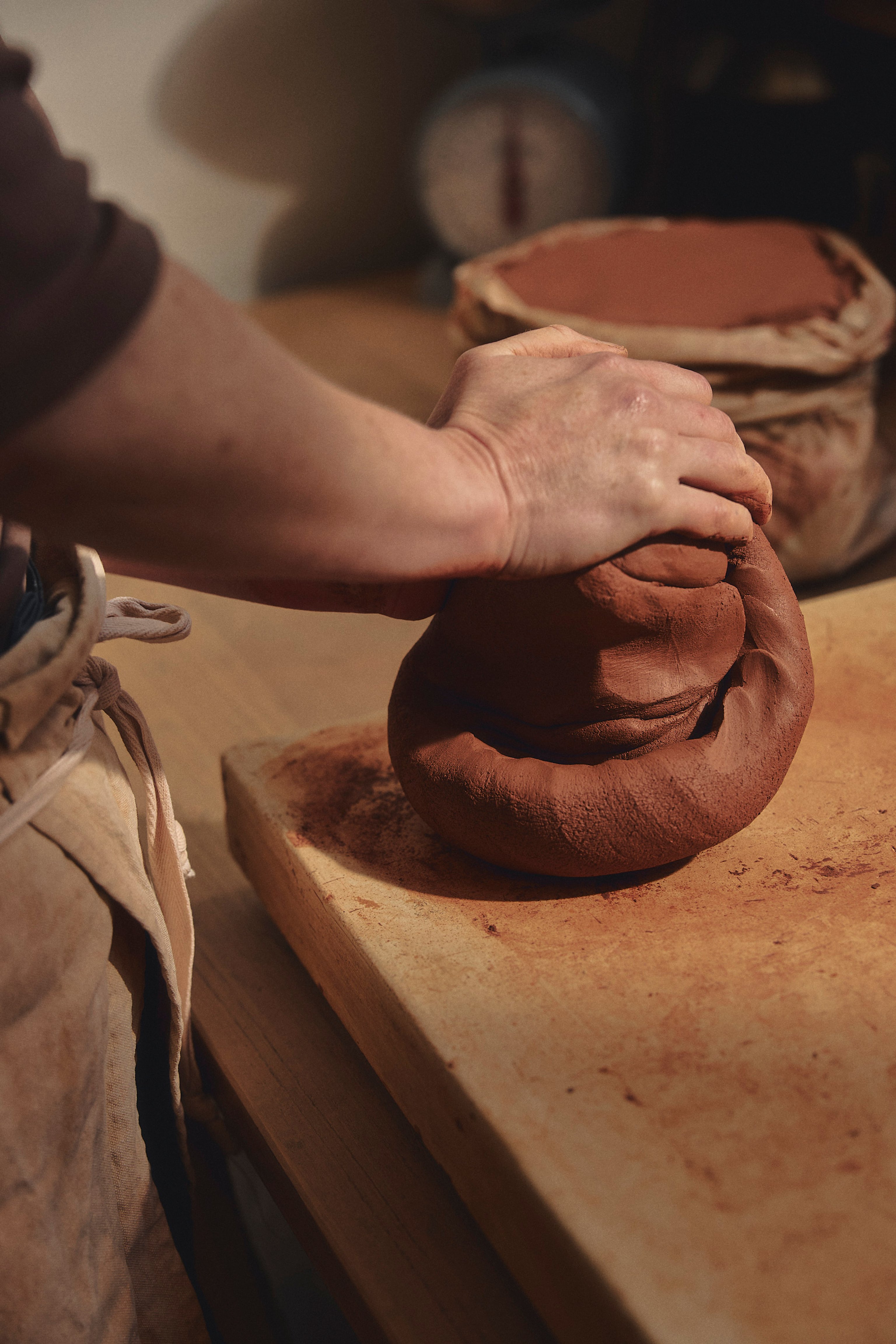 Belinda Wiltshire kneading clay in her Preston studio