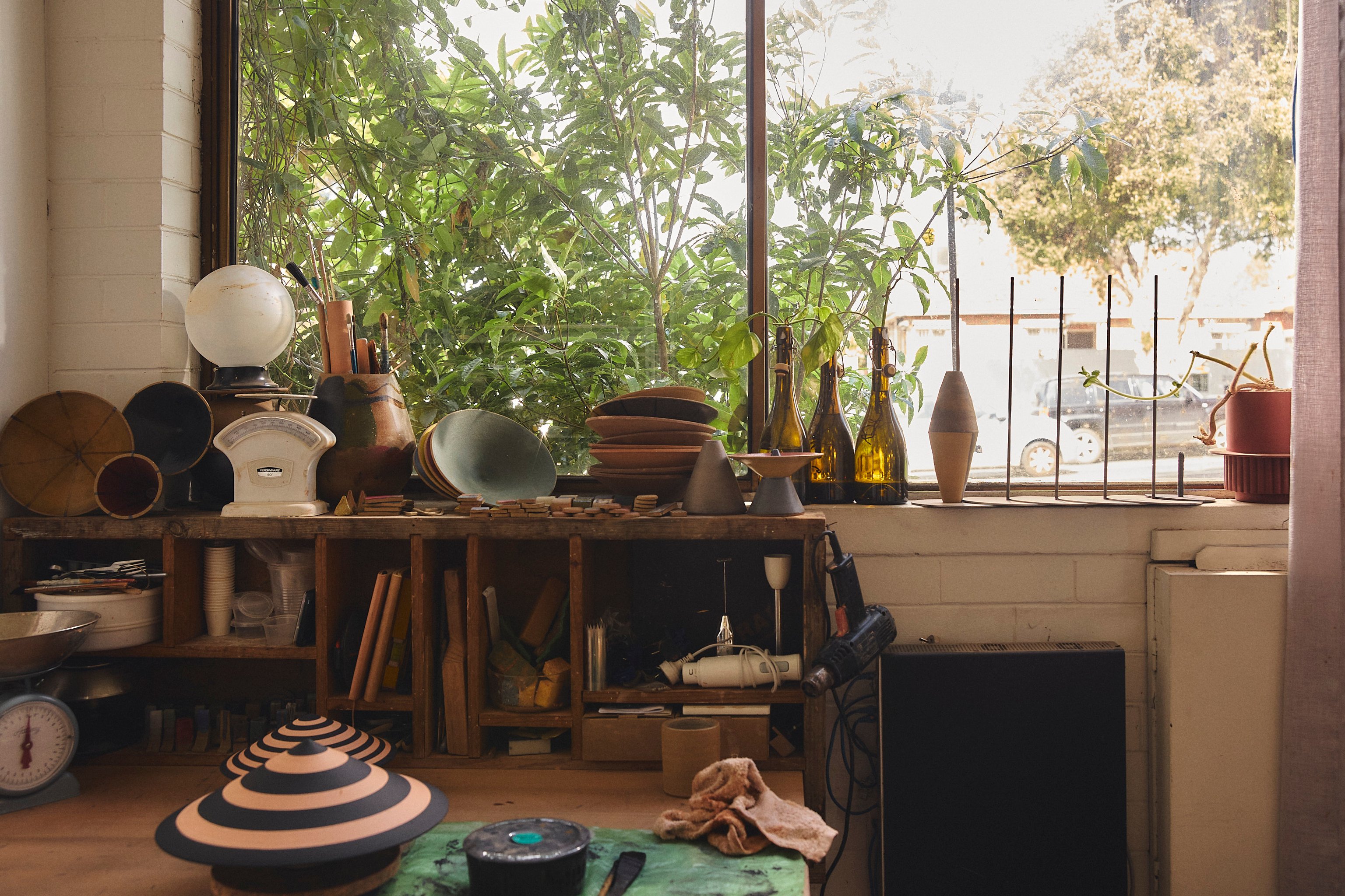 Belinda Wiltshire's Preston Studio with two Dancer ceramics on the bench