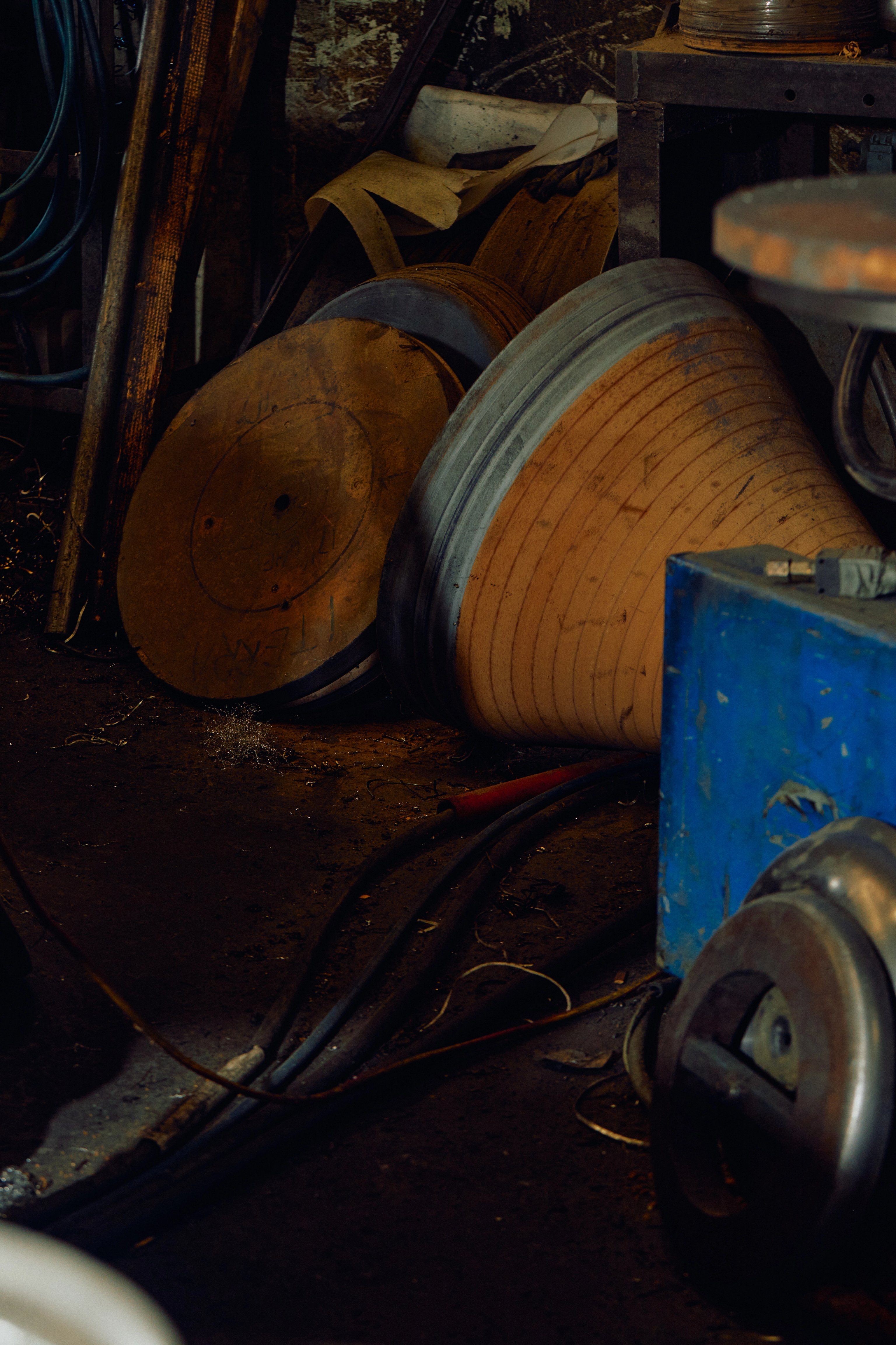 A collection of old timber mould sitting in an industrial factory