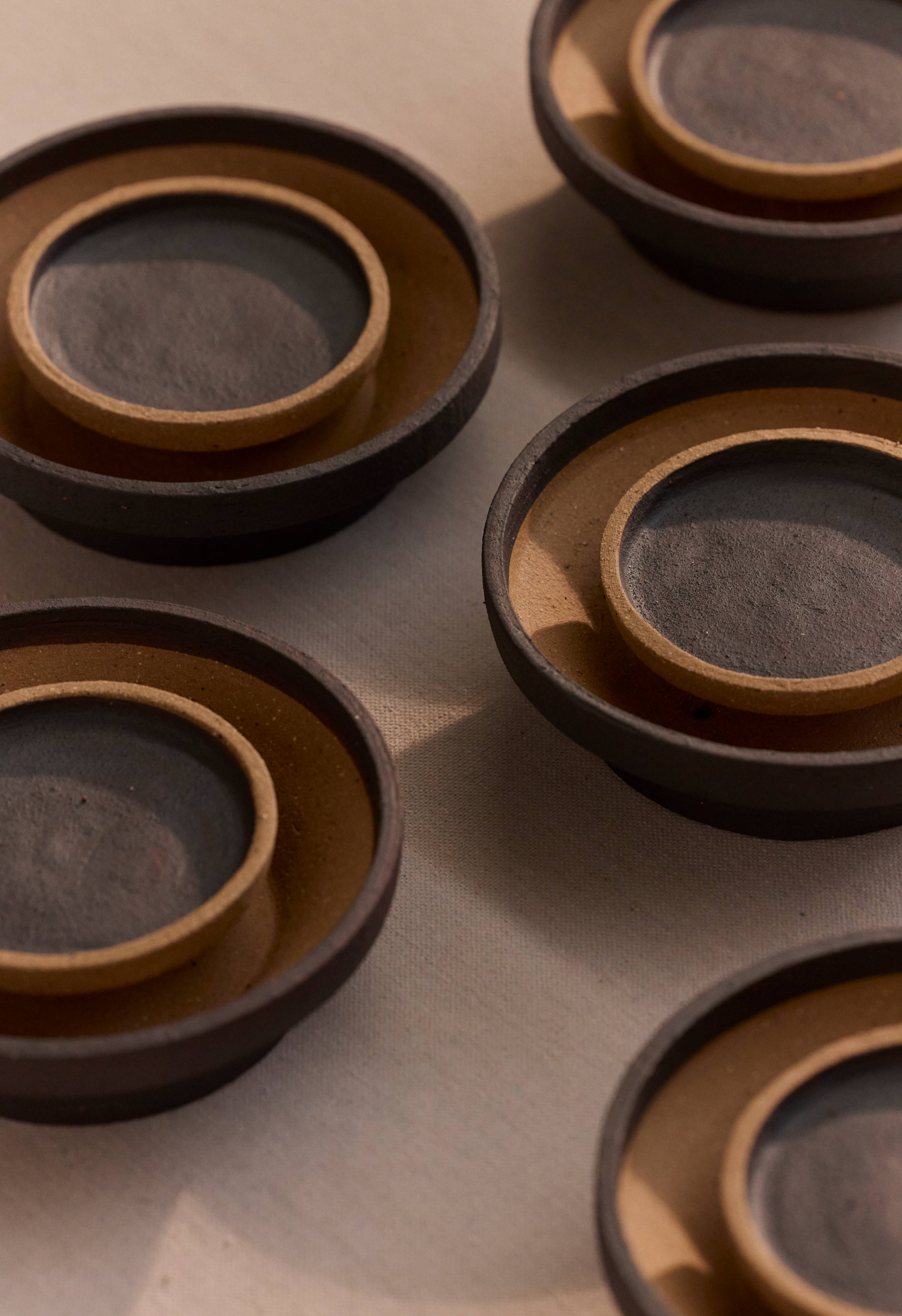 Chorus Wall Lights in Ceramic, clustered together.