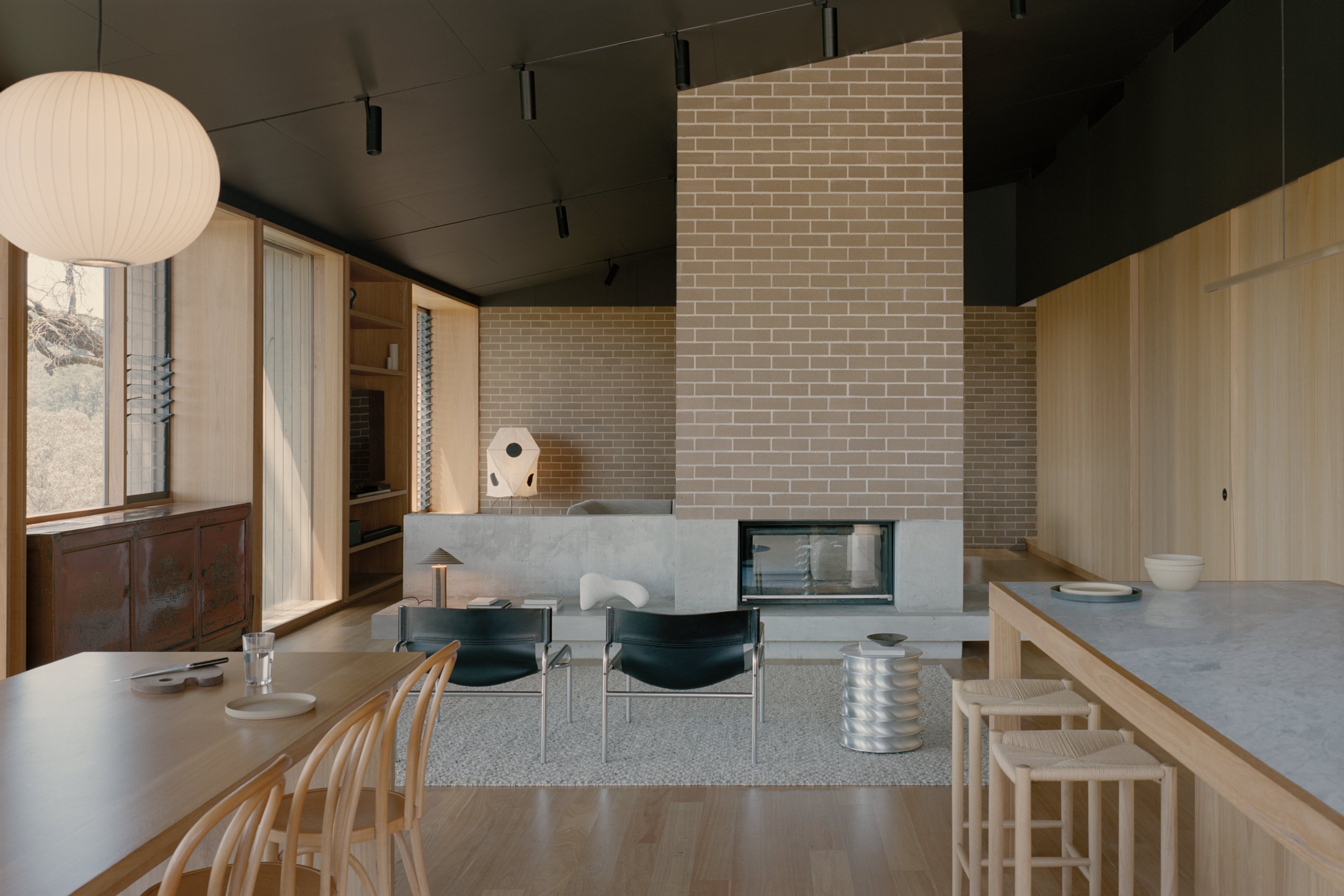 Living room with natural materials and warm neutral furniture.