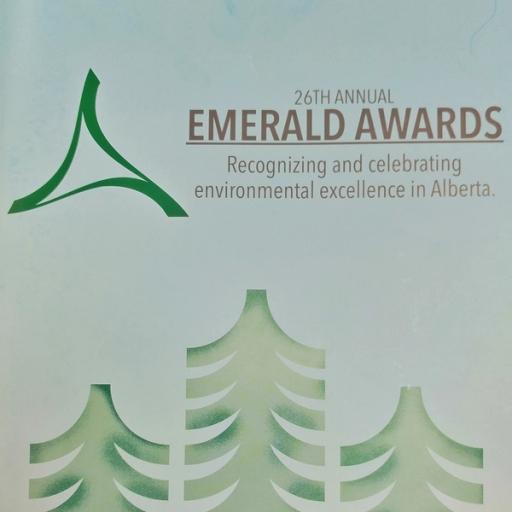 Presentation screen reading "26th Annual Emerald Awards: Recognizing and celebrating environmental excellence in Alberta"